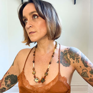 AMBER AND ANIMAL PRINT BEAD NECKLACE