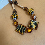 AMBER AND ANIMAL PRINT BEAD NECKLACE